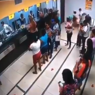 Video: Hillarious Reactions as Power Bank Explodes in Costumer's Pocket - Inside Bank 21 Screenshot 124